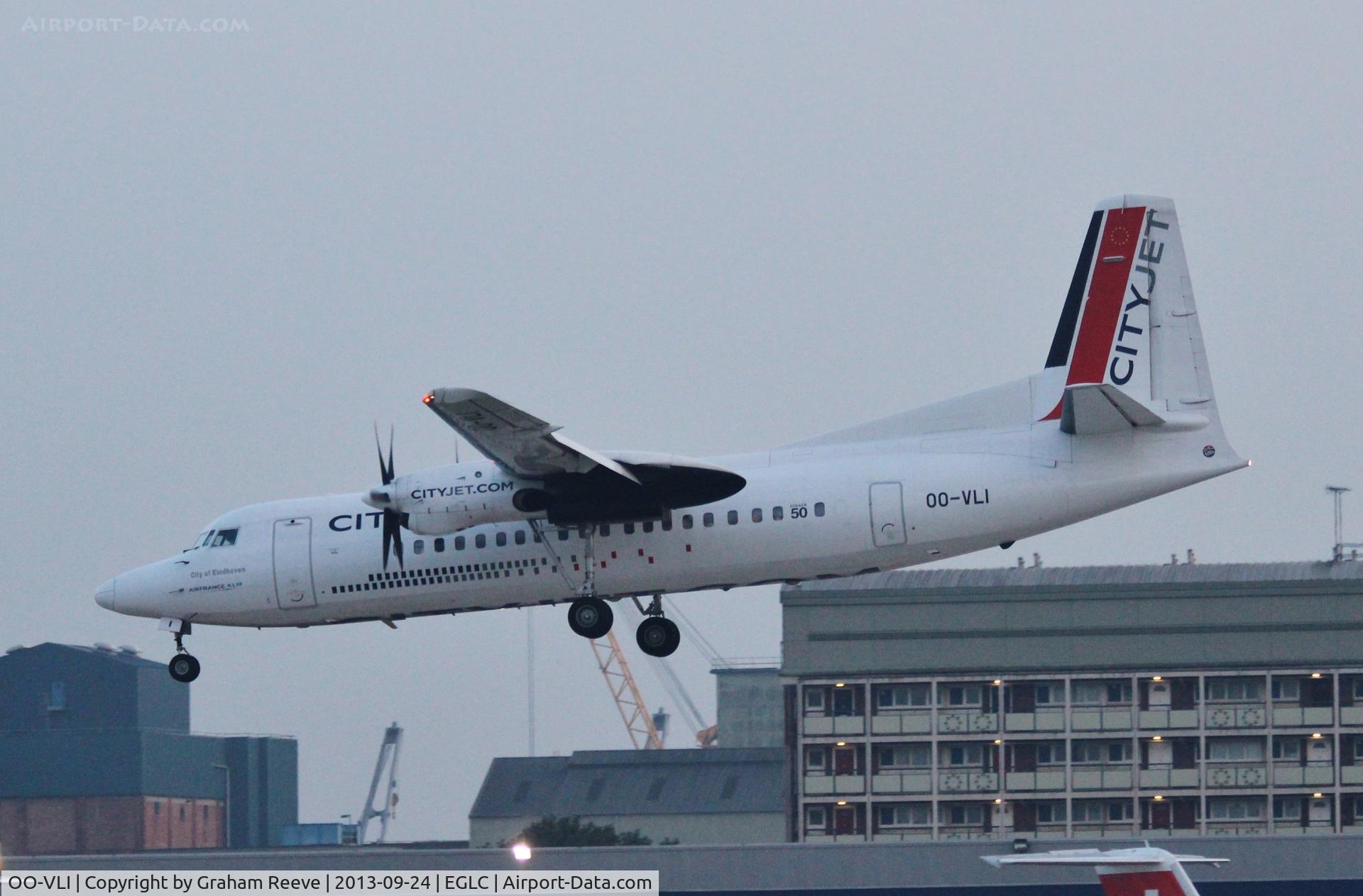 OO-VLI, 1991 Fokker 50 C/N 20226, Landing in the early evening twilight.