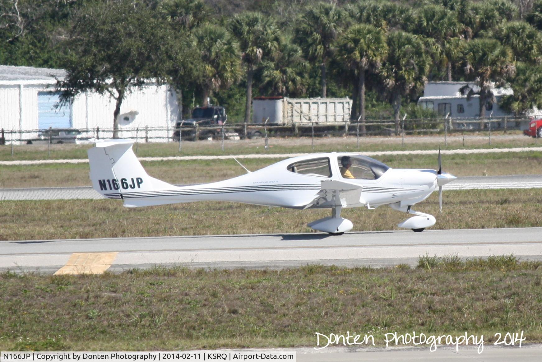 N166JP, 2005 Diamond DA-40 Diamond Star C/N 40.502, Diamond Star (N166JP) taxis at Sarasota-Bradenton International Airport