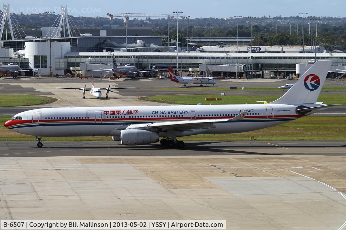 B-6507, 2008 Airbus A330-343E C/N 942, taxiing to 16R