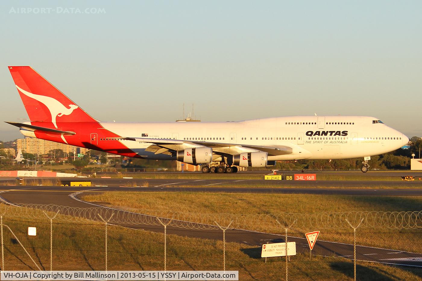 VH-OJA, 1989 Boeing 747-438 C/N 24354, just down onto 34L