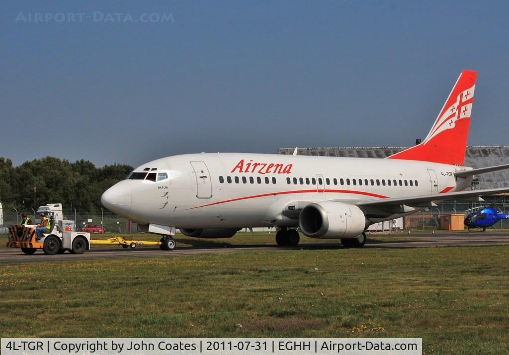 4L-TGR, 1990 Boeing 737-59D C/N 24694, Being towed to European Aviation