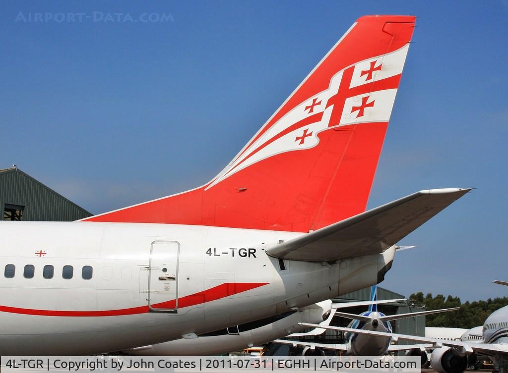 4L-TGR, 1990 Boeing 737-59D C/N 24694, Tail detail of a rare visitor