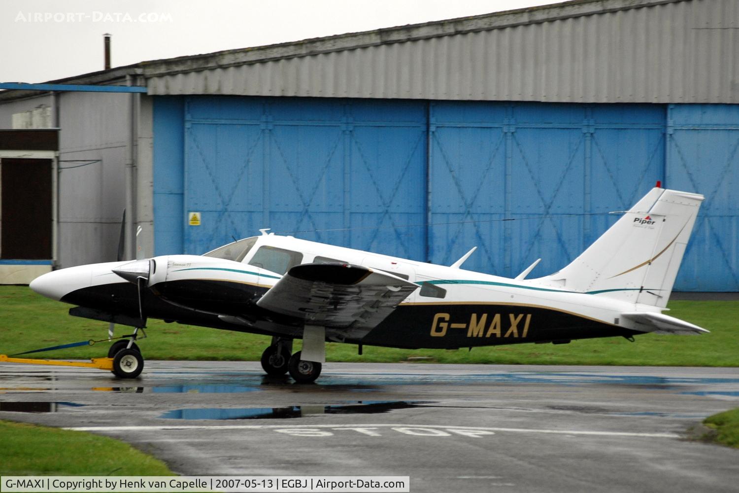 G-MAXI, 1976 Piper PA-34-200T C/N 34-7670150, Piper Seneca at rainy Staverton airport.