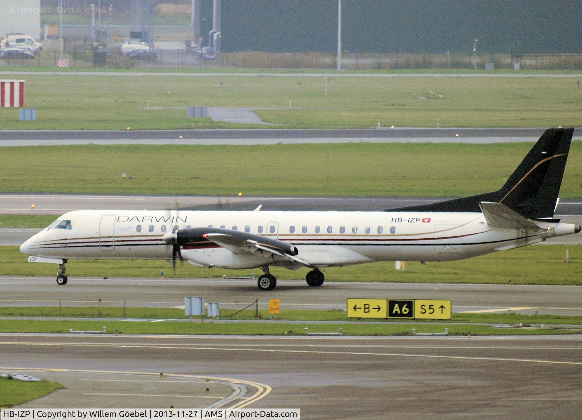 HB-IZP, 1996 Saab 2000 C/N 2000-031, Taxi to runway 18L of Schiphol Airport