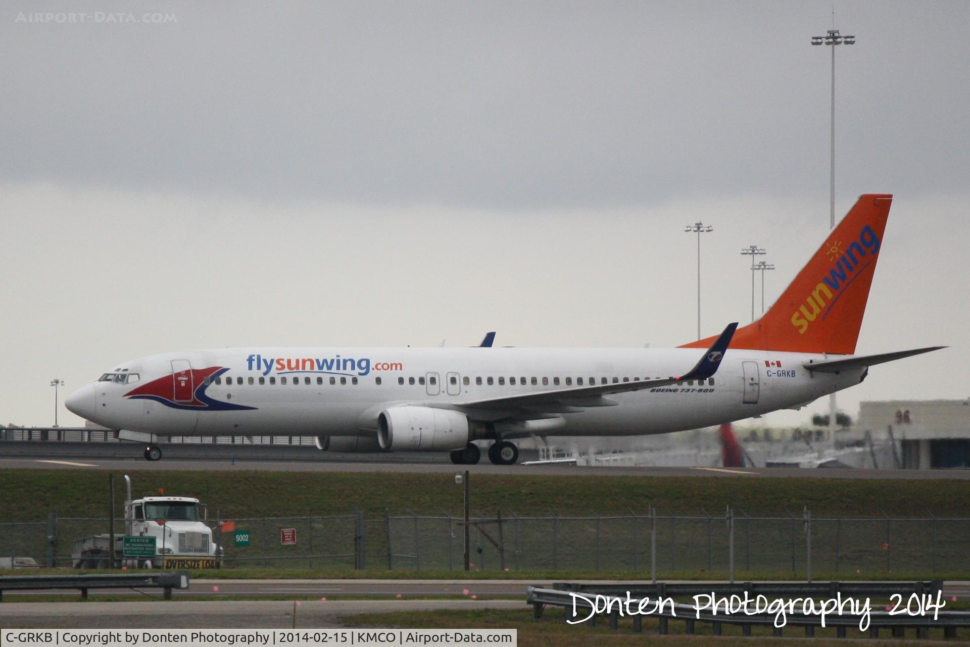 C-GRKB, 2004 Boeing 737-86Q C/N 30294, Sunwing Flight 30 (C-GRKB) arrives at Orlando International Airport following a flight from Toronto-Pearson International Airport
