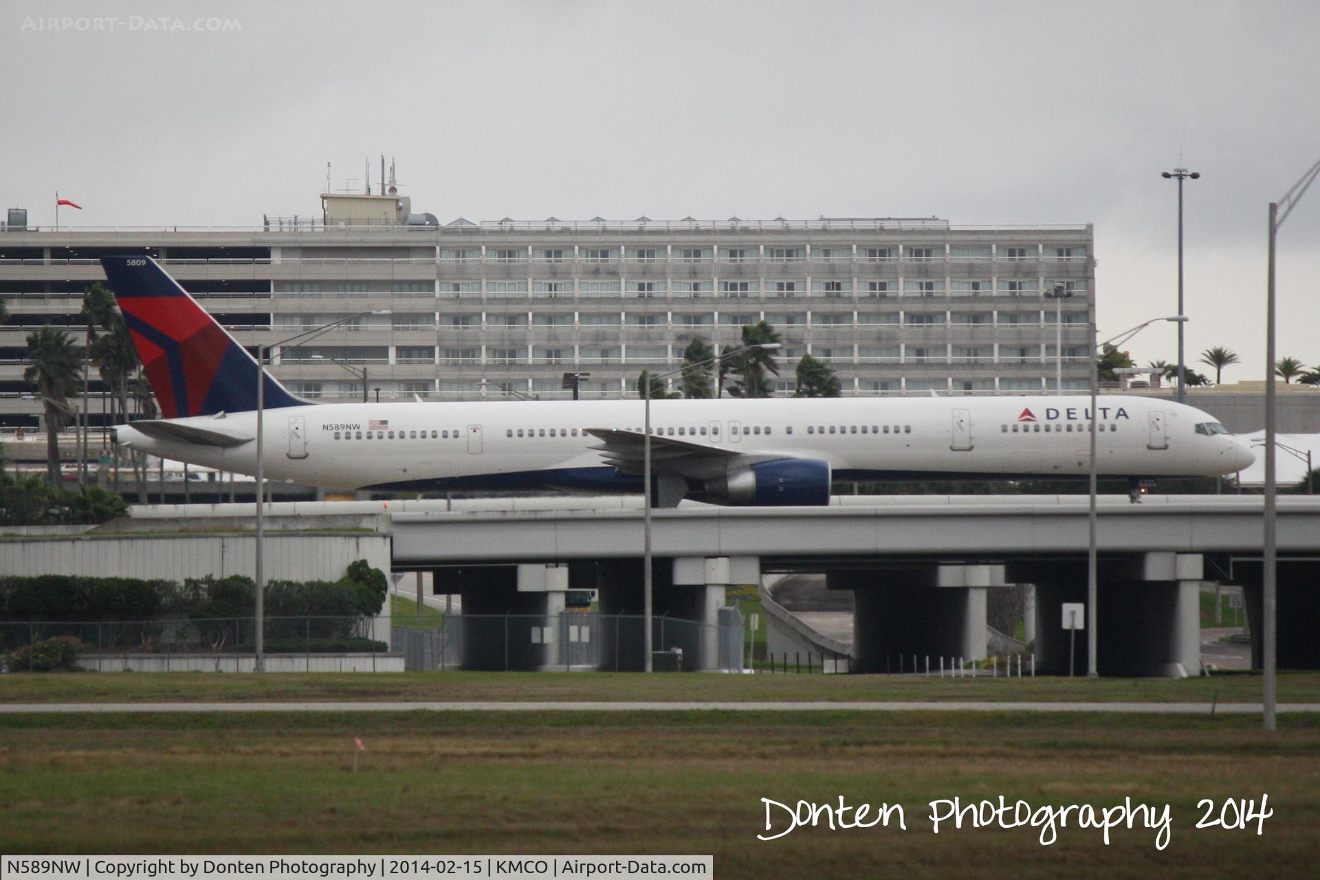 N589NW, 2003 Boeing 757-351 C/N 32989, Delta Flight 2118 (N589NW) arrives at Orlando International Airport following a flight from Hartsfield-Jackson Atlanta International Airport