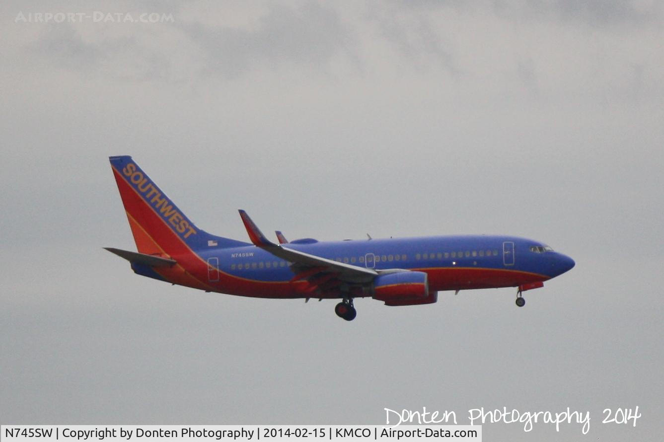 N745SW, 1999 Boeing 737-7H4 C/N 29491, Southwest Flight 2145 (N745SW) arrives at Orlando International Airport following a flight from Bishop International Airport