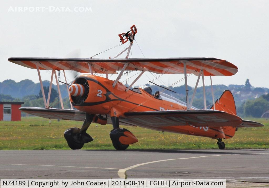 N74189, 1941 Boeing PT-17/R985 Kaydet (A75N1) C/N 75-717, Off to perform at the seafront