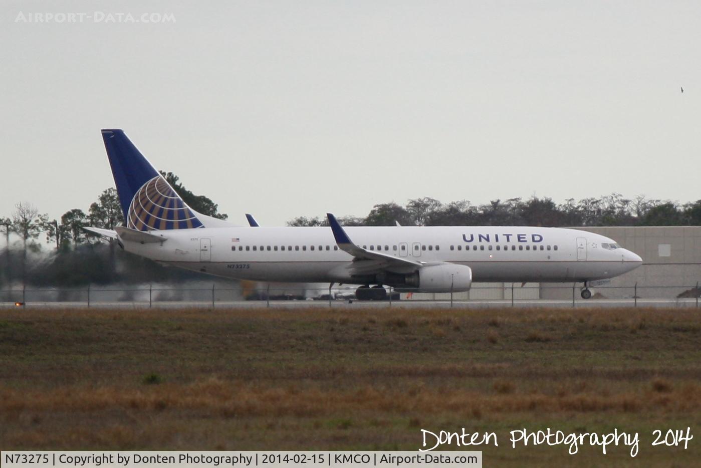 N73275, 2002 Boeing 737-824 C/N 31593, United Flght 1475 (N73275) departs Orlando Internatonal Airport enroute to Denver International Airport