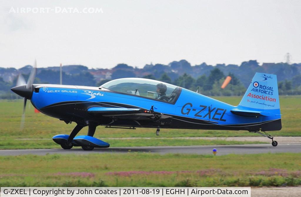 G-ZXEL, 2006 Extra EA-300L C/N 1224, Off to perform at the seafront