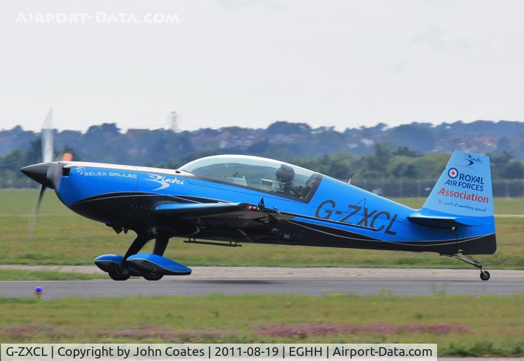 G-ZXCL, 2006 Extra EA-300L C/N 1223, Off to perform at the seafront