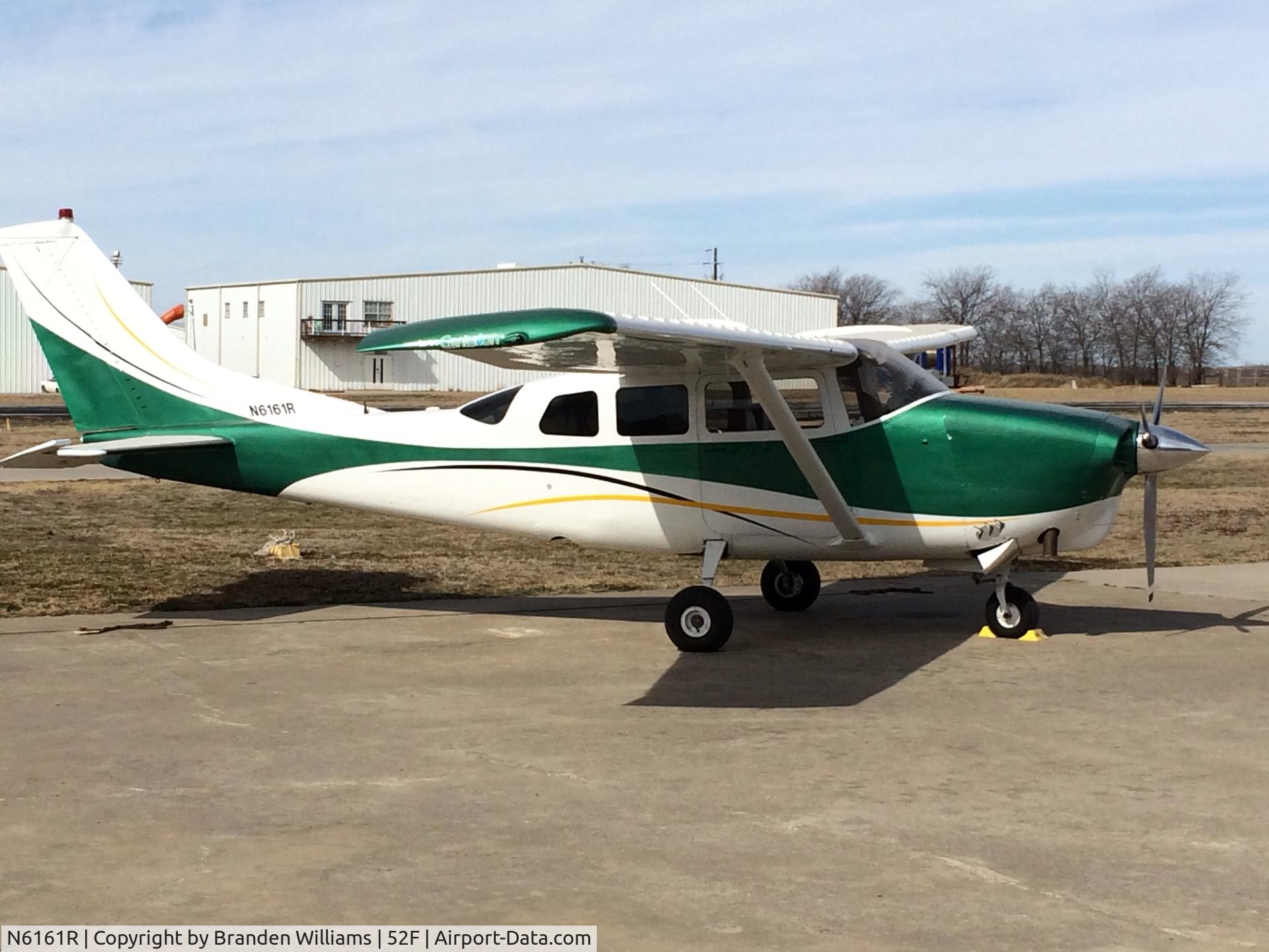 N6161R, 1965 Cessna T210F Turbo Centurion C/N T210-0061, Sitting outside Blue Hangar Cafe, 52F.