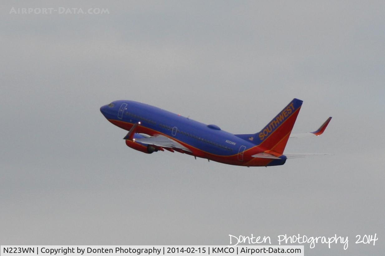 N223WN, 2005 Boeing 737-7H4 C/N 32492, Southwest Flight 1976 (N223WN) departs Orlando International Airport enroute to Raleigh-Durham International Airport