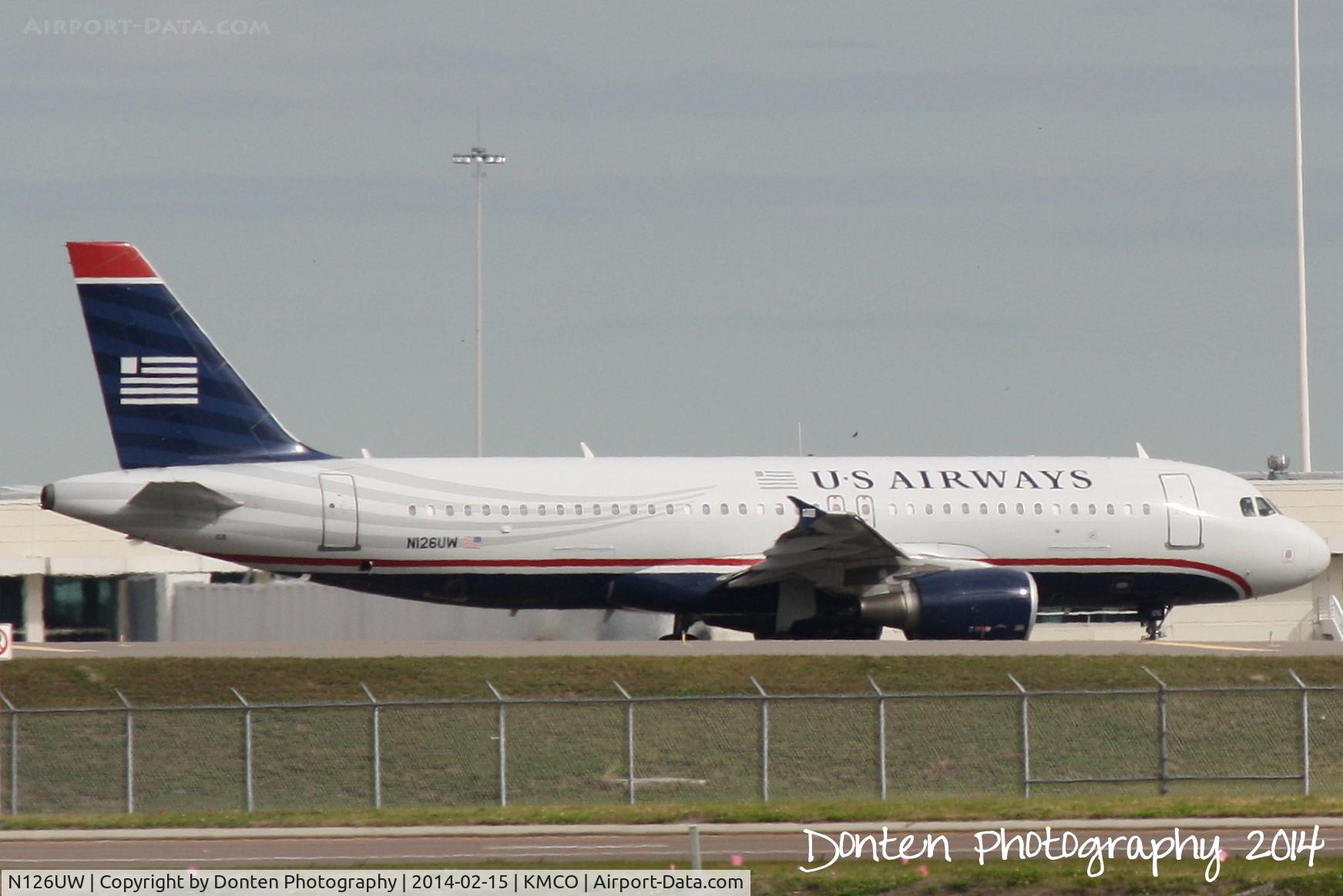 N126UW, 2009 Airbus A320-214 C/N 4149, US Air Flight 1872 (N126UW) departs Orlando International Airport enroute to Reagan National Airport