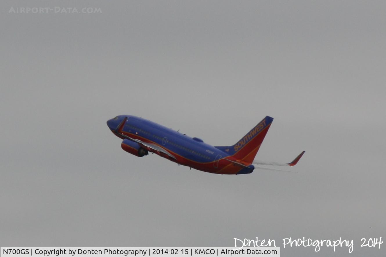 N700GS, 1997 Boeing 737-7H4 C/N 27835, Southwest Flight 2151 (N700GS) departs Orlando International Airport enroute to Lambert-St Louis International Airport