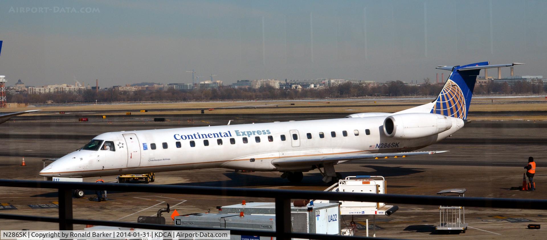 N286SK, 2001 Embraer EMB-145LR C/N 145443, Taxi to park National