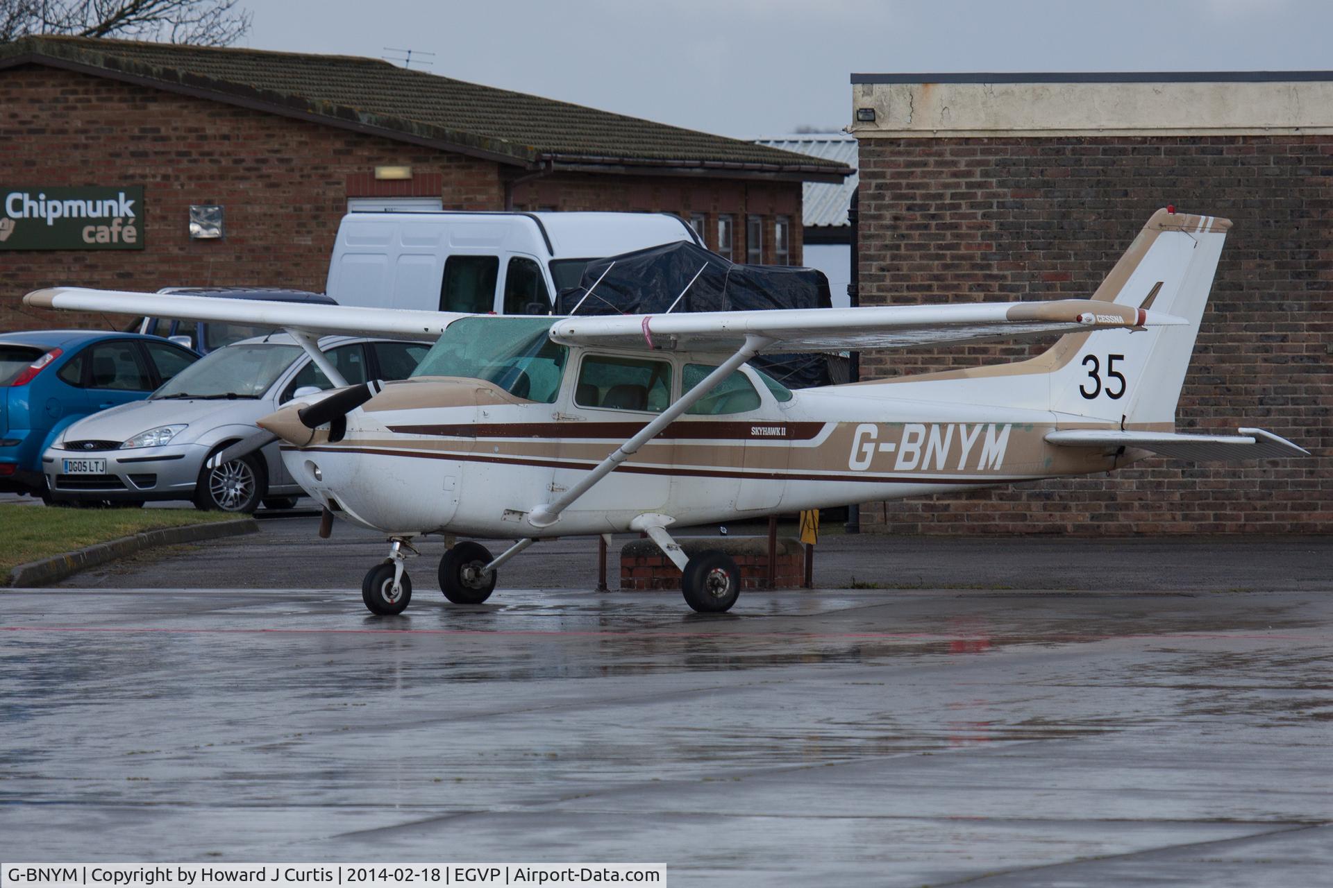 G-BNYM, 1980 Cessna 172N C/N 172-73854, A resident here. The 35 is a number used for air racing.