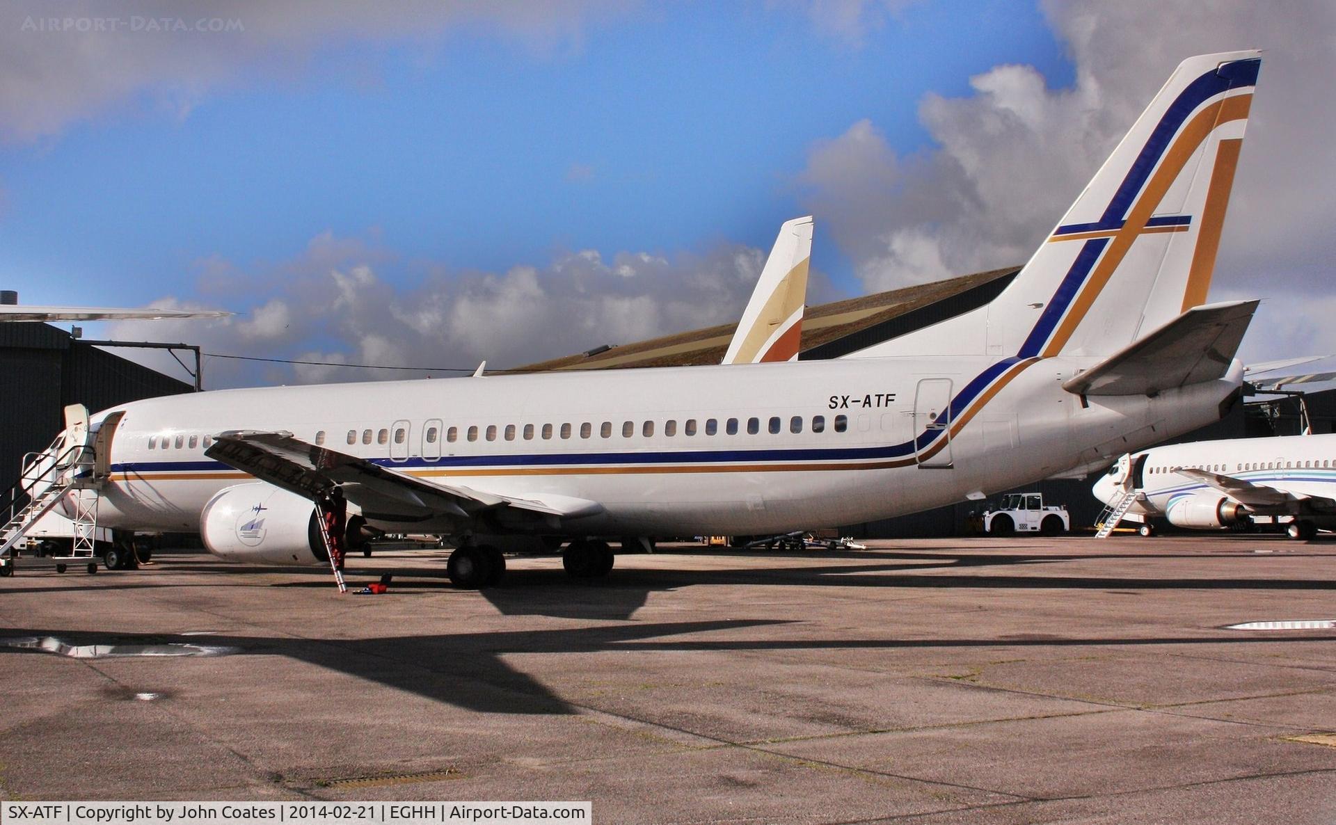 SX-ATF, 1992 Boeing 737-406 C/N 25423, Tottenham Hotspur taxi pops in for some attention.