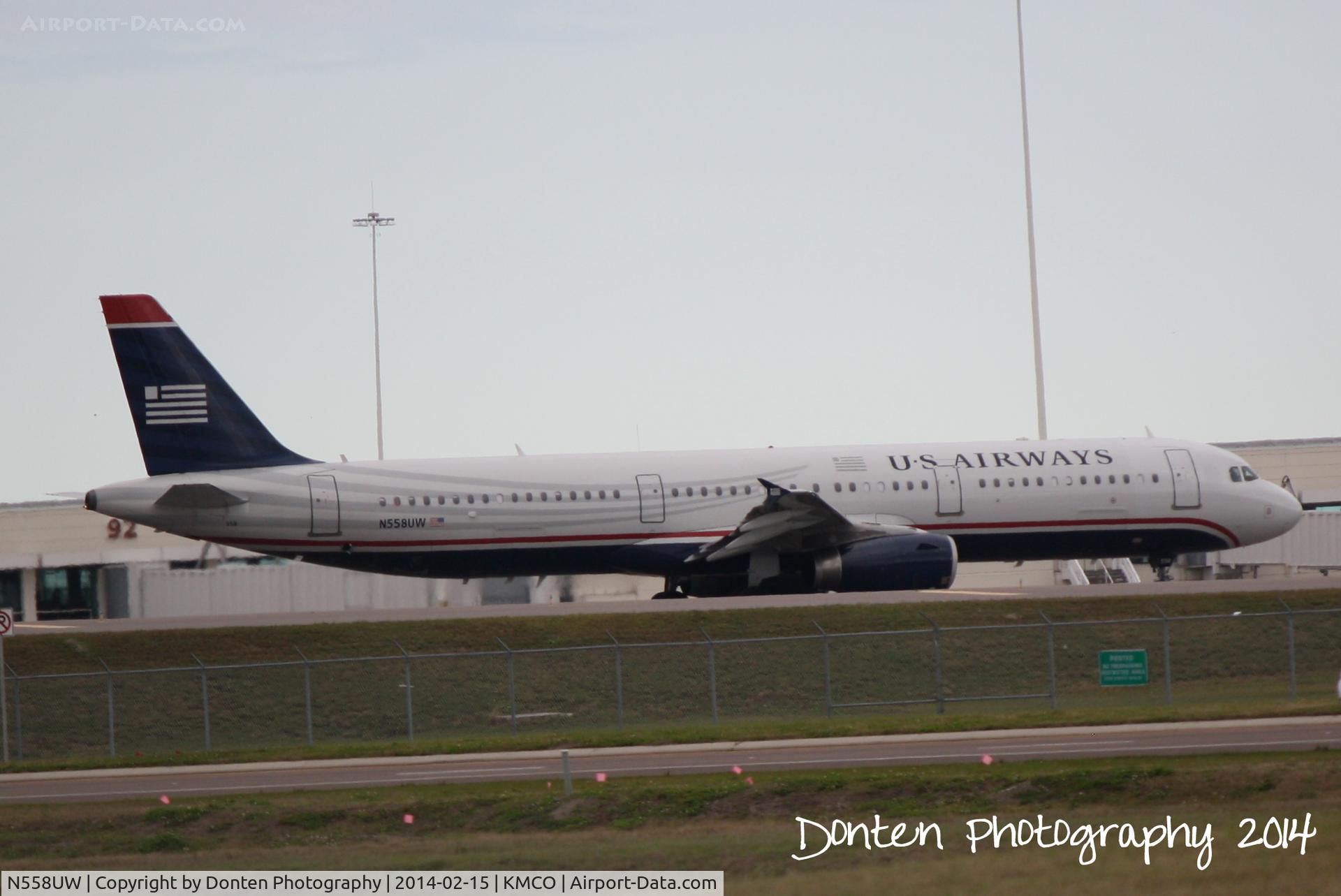 N558UW, 2012 Airbus A321-231 C/N 5282, US Air Flight 1850 (N558UW) taxis at Orlando International Airport for flight to Philadelphia International Airport