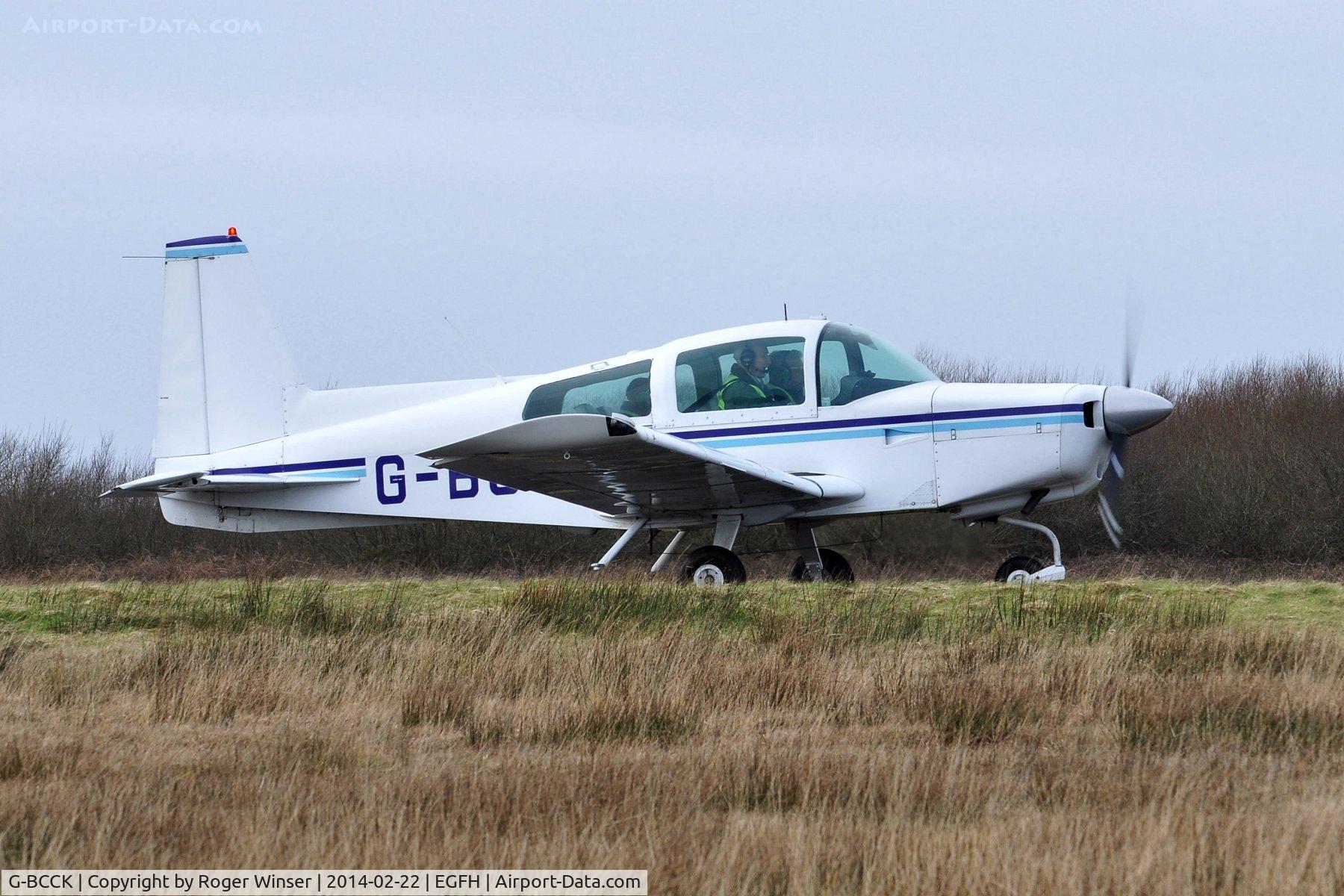 G-BCCK, 1974 Grumman American AA-5 Traveler C/N AA5-0547, Visiting Traveler holding prior to departure.