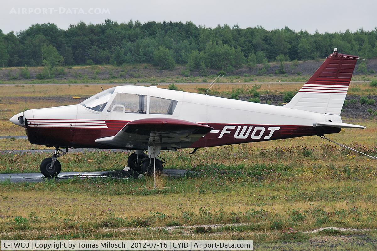 C-FWOJ, 1965 Piper PA-28-140 C/N 28-20862, Seen on a rainy day in Digby.