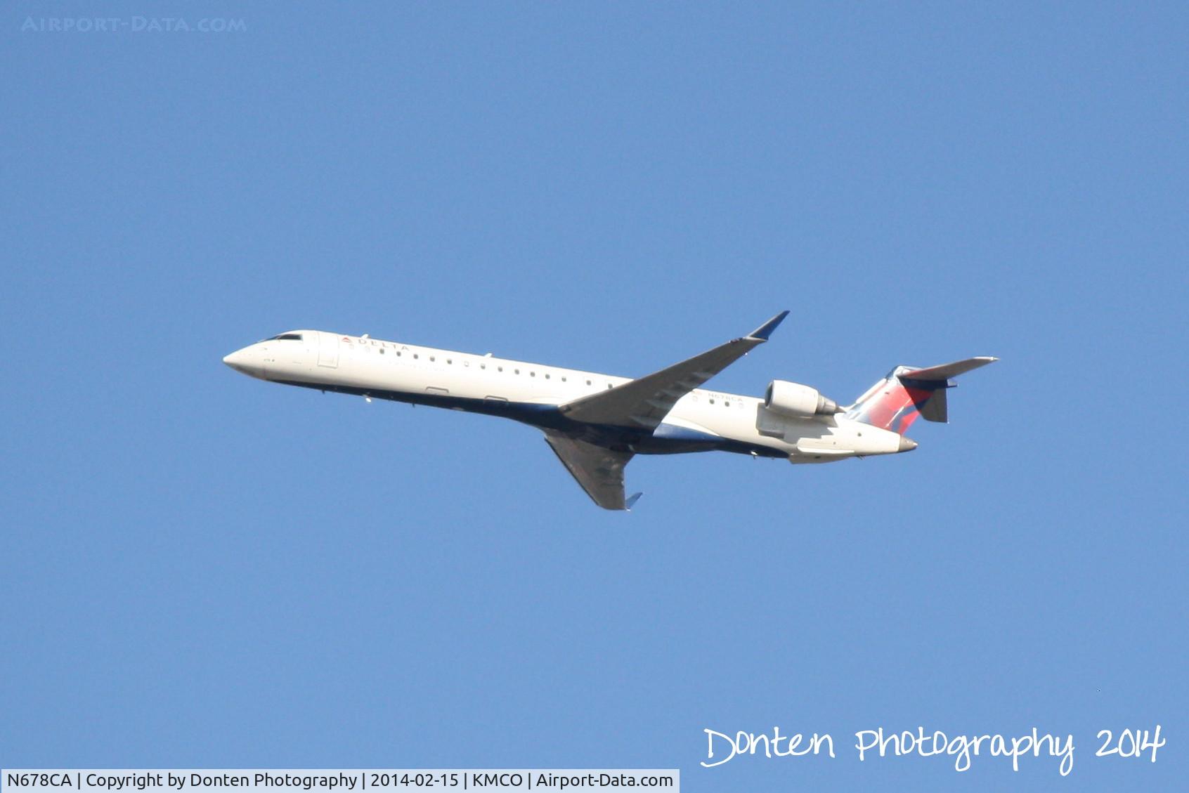 N678CA, 2007 Bombardier CRJ-900ER (CL-600-2D24) C/N 15125, Delta Flight 5603 operated by Express Jet (N678CA) departs Orlando International Airport enroute to San Antonio International Airport