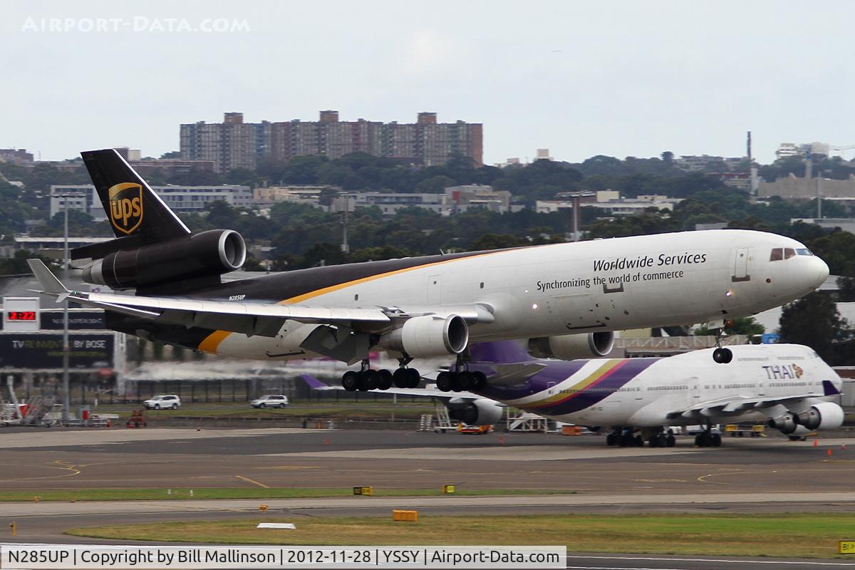 N285UP, 1992 McDonnell Douglas MD-11F C/N 48457, about to kiss 16R