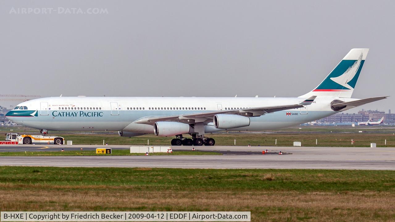 B-HXE, 1996 Airbus A340-313 C/N 157, towed to the gate