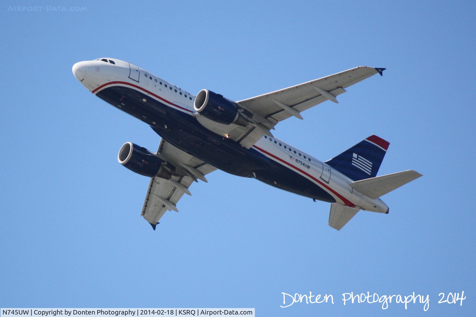 N745UW, 2000 Airbus A319-112 C/N 1289, US Air Flight 1801 (N754UW) departs Sarasota-Bradenton International Airport enroute to Charlotte-Douglas International Airport