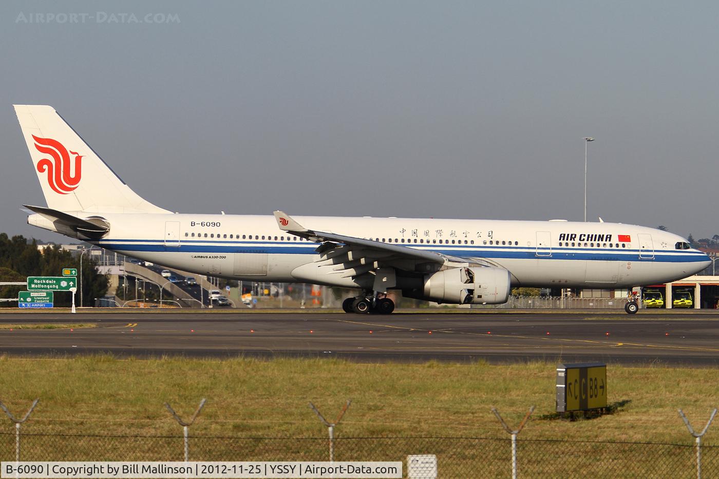 B-6090, 2007 Airbus A330-243 C/N 860, just down onto 34L
