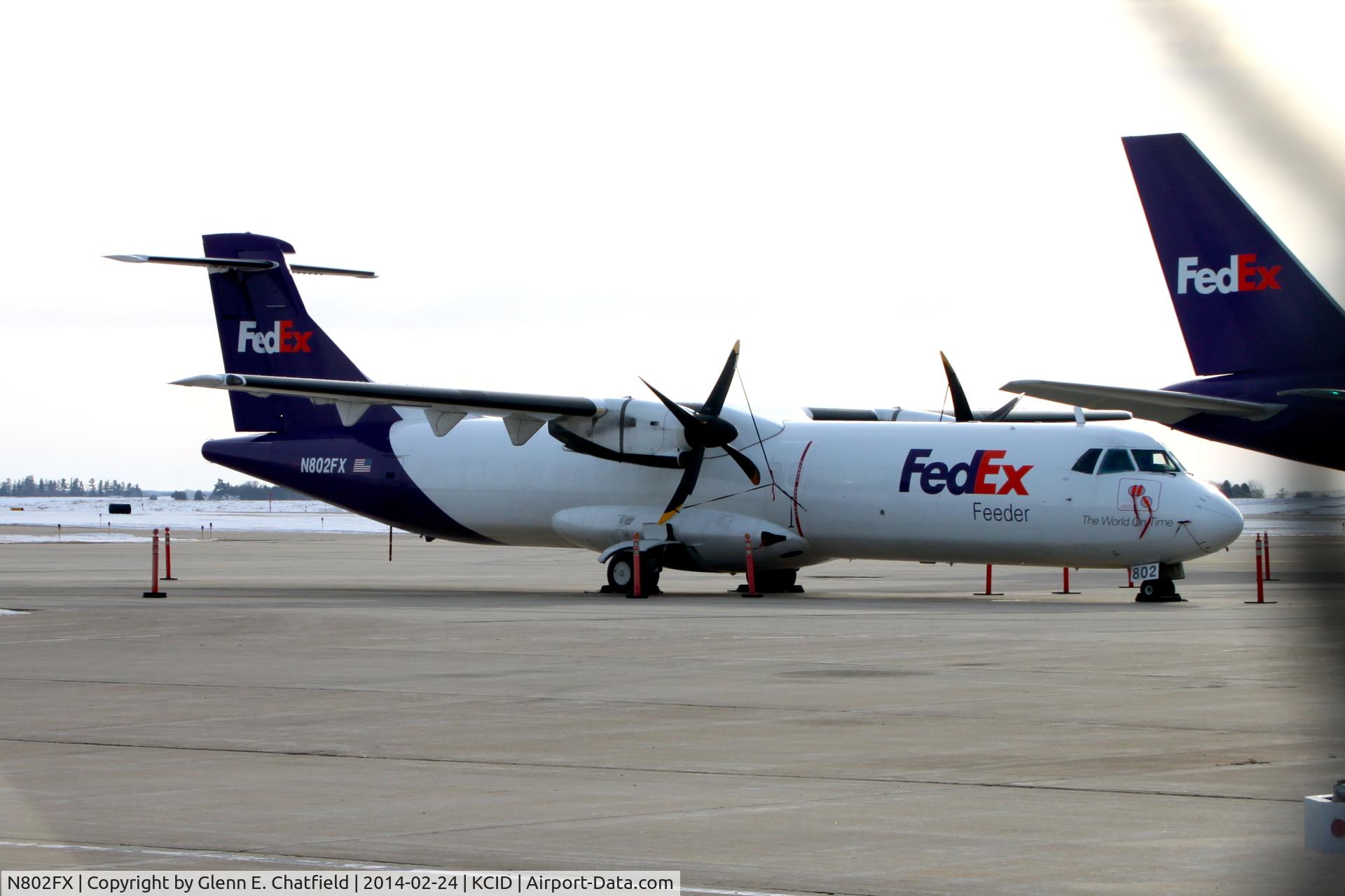N802FX, 1992 ATR 72-212 C/N 344, At the FedEx ramp, photographed through a chain-link fence