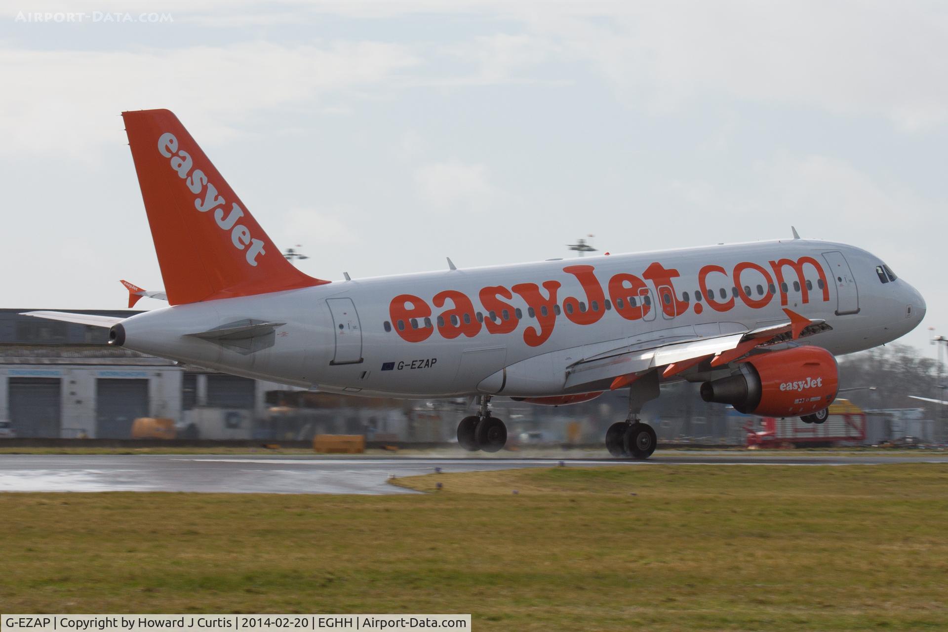G-EZAP, 2006 Airbus A319-111 C/N 2777, Touching down on runway 26; arriving on a schedule from Geneva.
