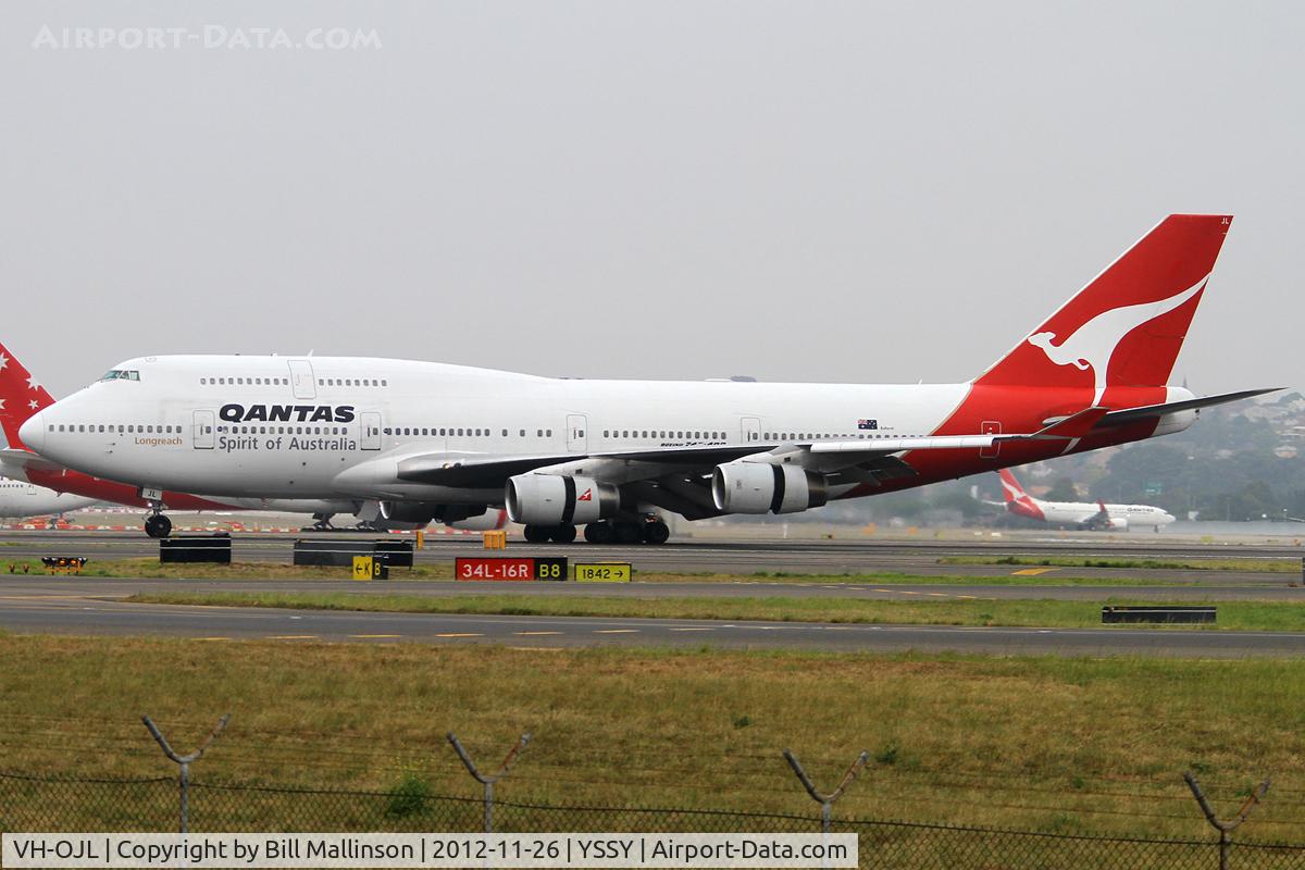 VH-OJL, 1991 Boeing 747-438 C/N 25151, just landed on 16R