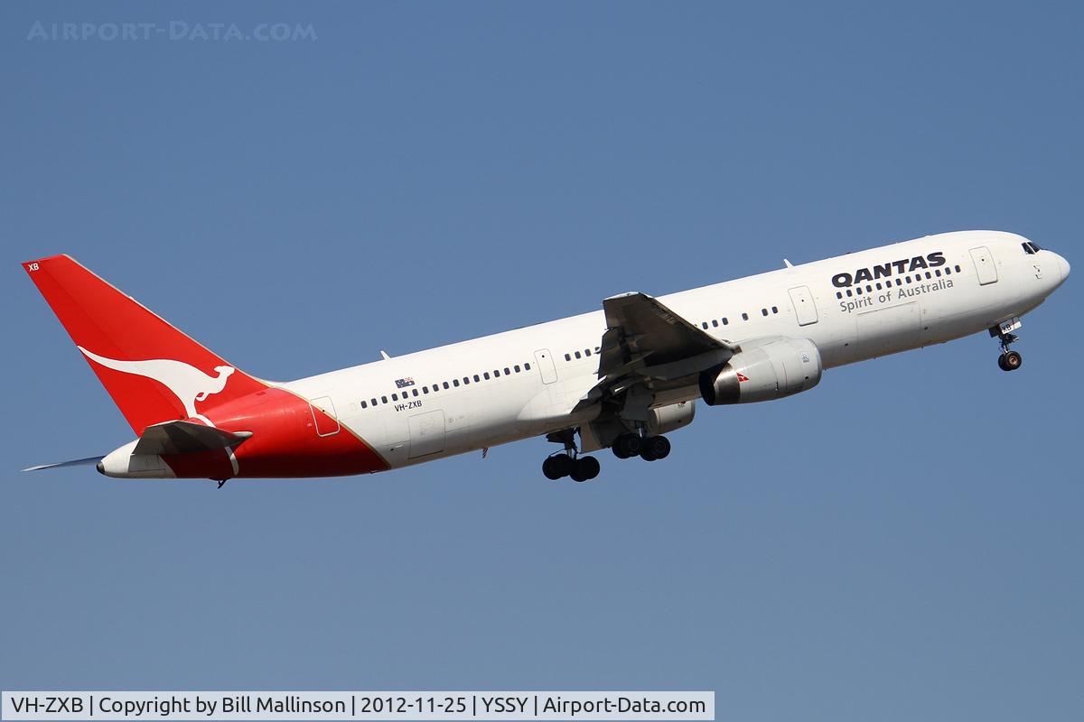 VH-ZXB, 1990 Boeing 767-336 C/N 24338, away from 34L