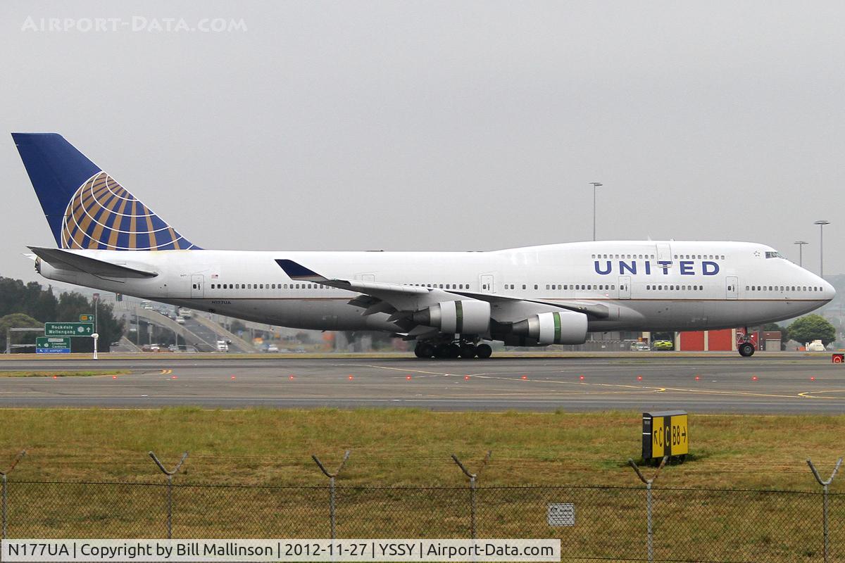 N177UA, 1990 Boeing 747-422 C/N 24384, taxi after landing on 34L