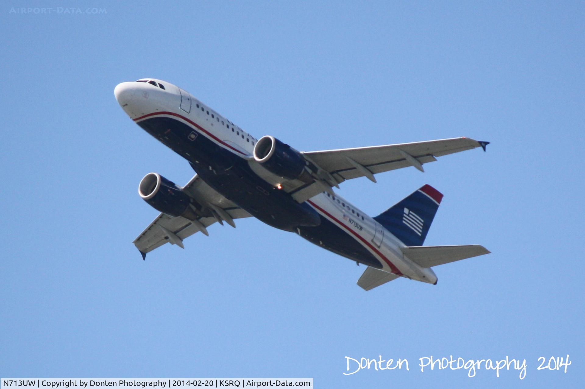 N713UW, 1999 Airbus A319-112 C/N 1040, US Air Flight 1801 (N713UW) departs Sarasota-Bradenton International Airport enroute to Charlotte-Douglas International Airport