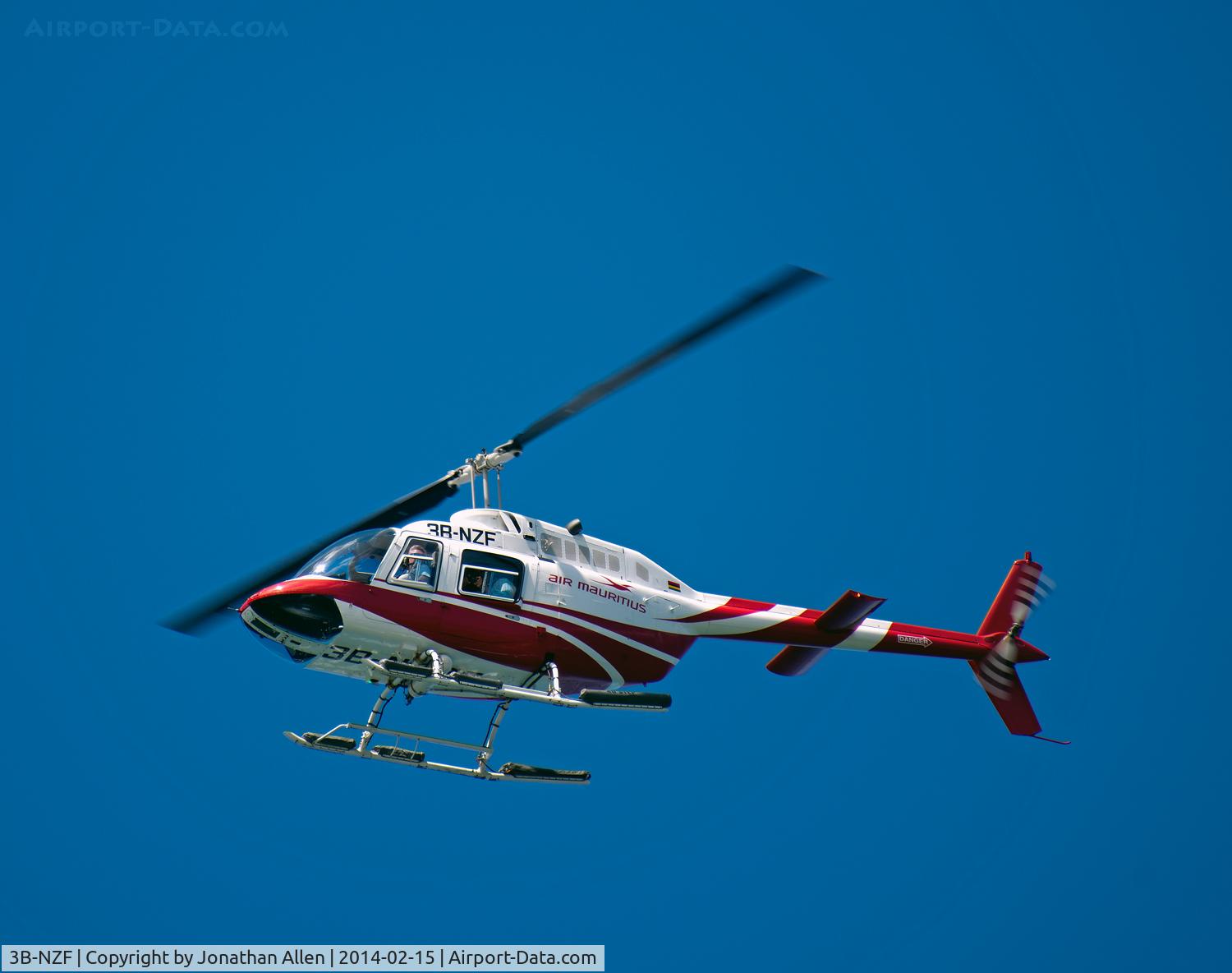 3B-NZF, 1985 Bell 206B-3 JetRanger C/N 4496, Over Baie aux Tortues during a round-Mauritius sight-seeing flight.