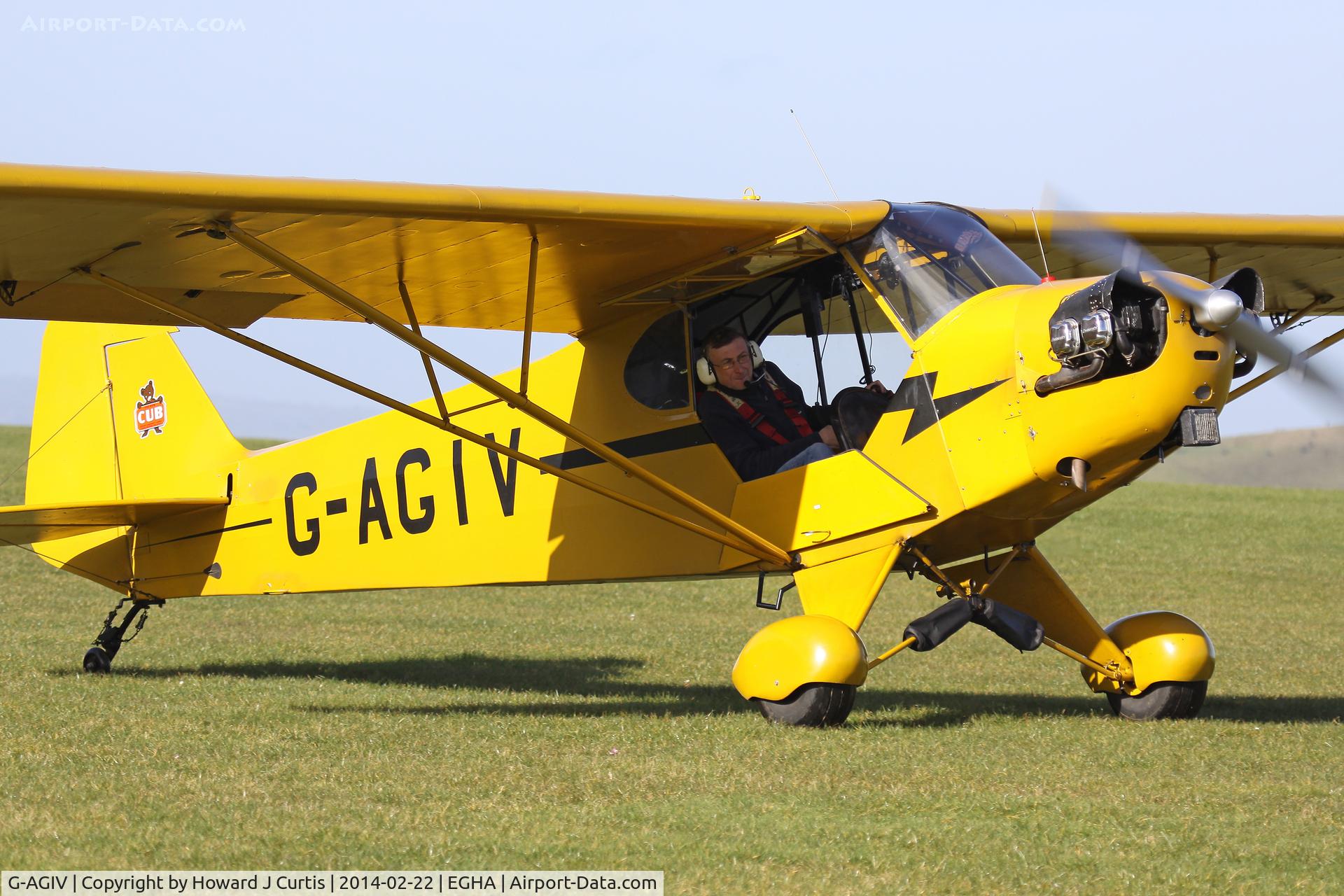 G-AGIV, 1944 Piper L-4J Grasshopper (J3C-65D) C/N 12676, Heading out in the sunshine.