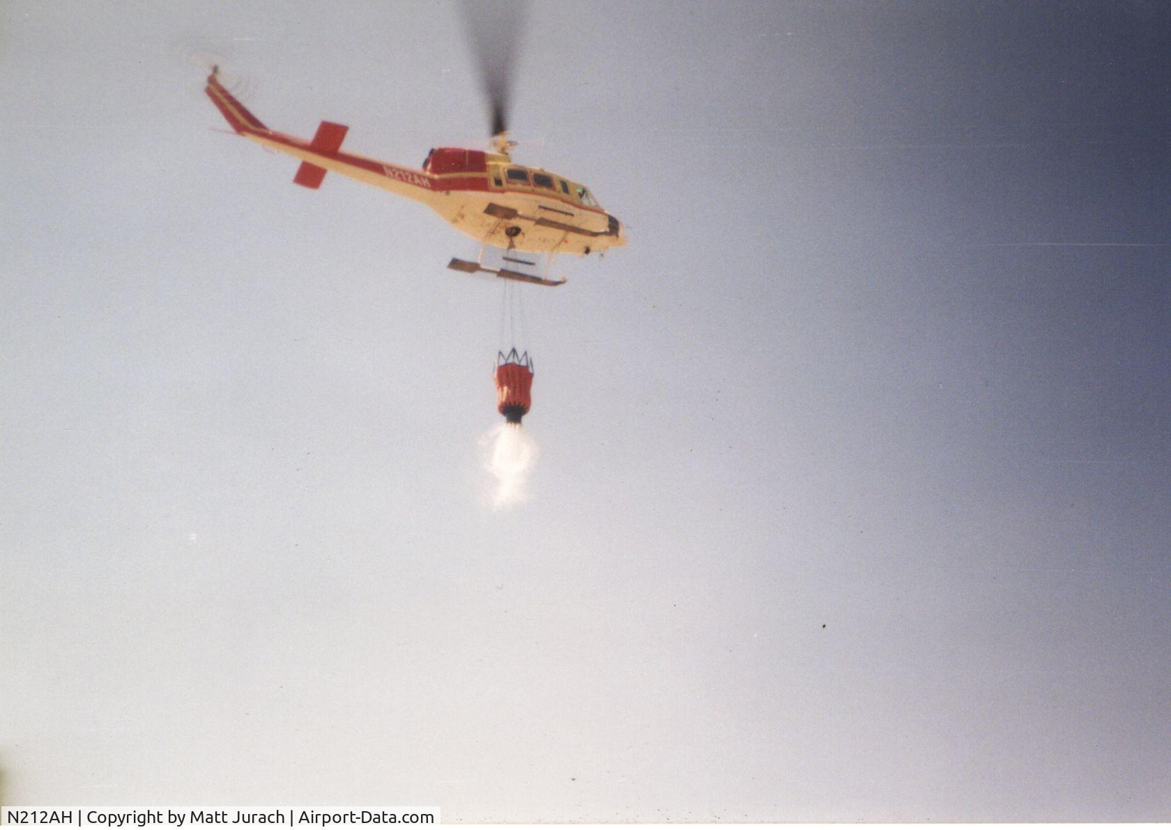 N212AH, 1979 Bell 212 C/N 30959, Working with a Bambi Bucket on the Leamington Complex in Idaho, July 1996