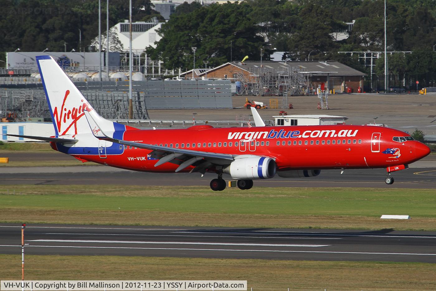 VH-VUK, 2007 Boeing 737-8FE C/N 36602/2353, landing on 16R