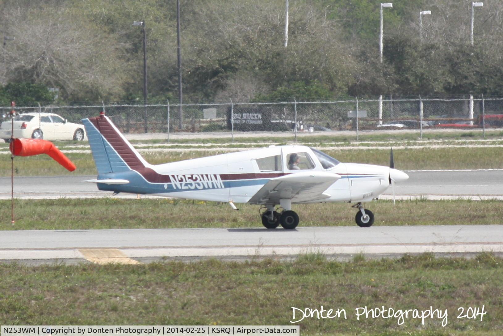 N253WM, 1964 Piper PA-28-180 C/N 28-2026, Piper Cherokee (N253WM) taxis at Sarasota-Bradenton International Airport