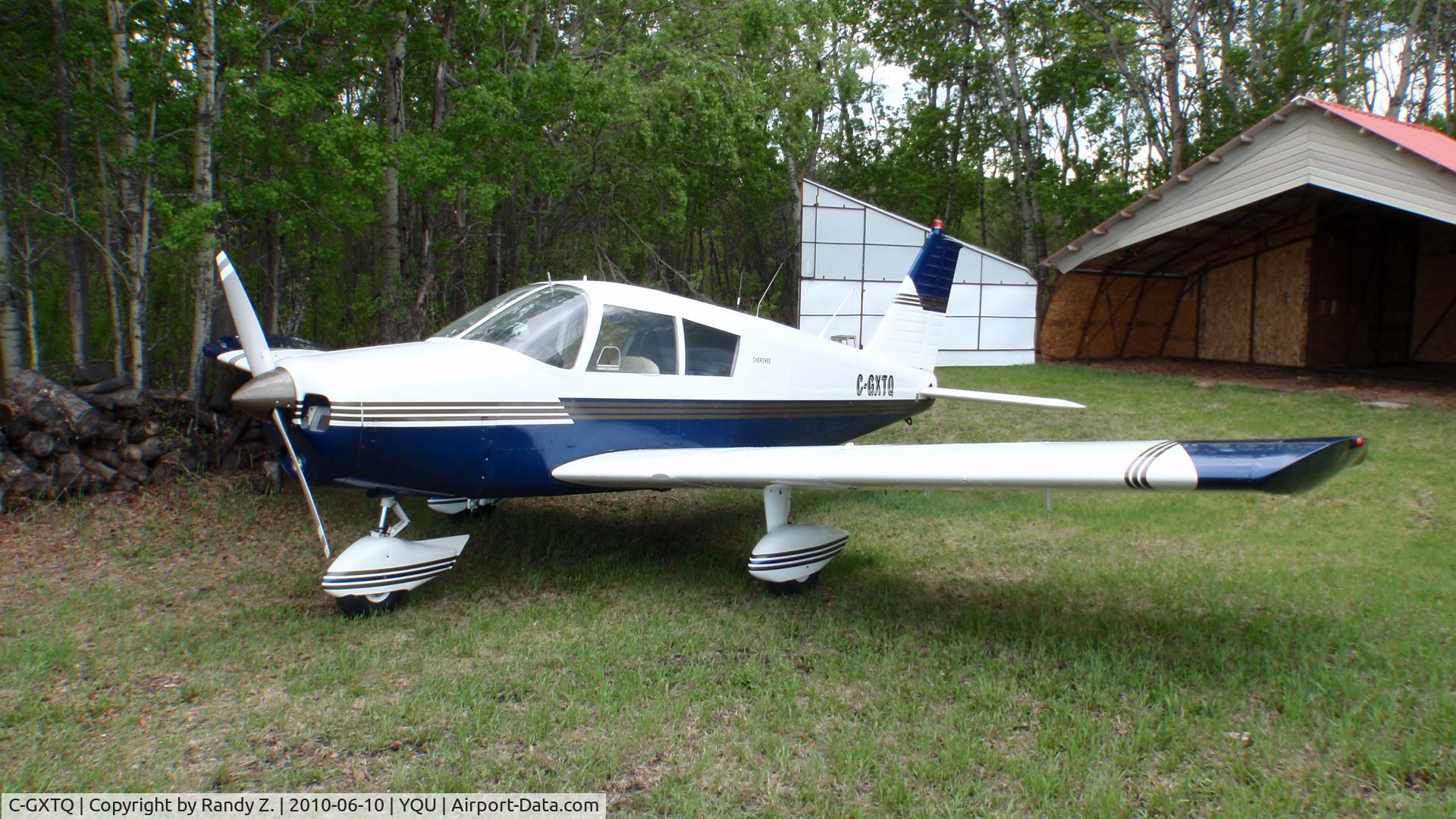 C-GXTQ, 1969 Piper PA-28-140 C/N 28-26444, aircraft at hanger at private strip east of Grande Prairie Alberta