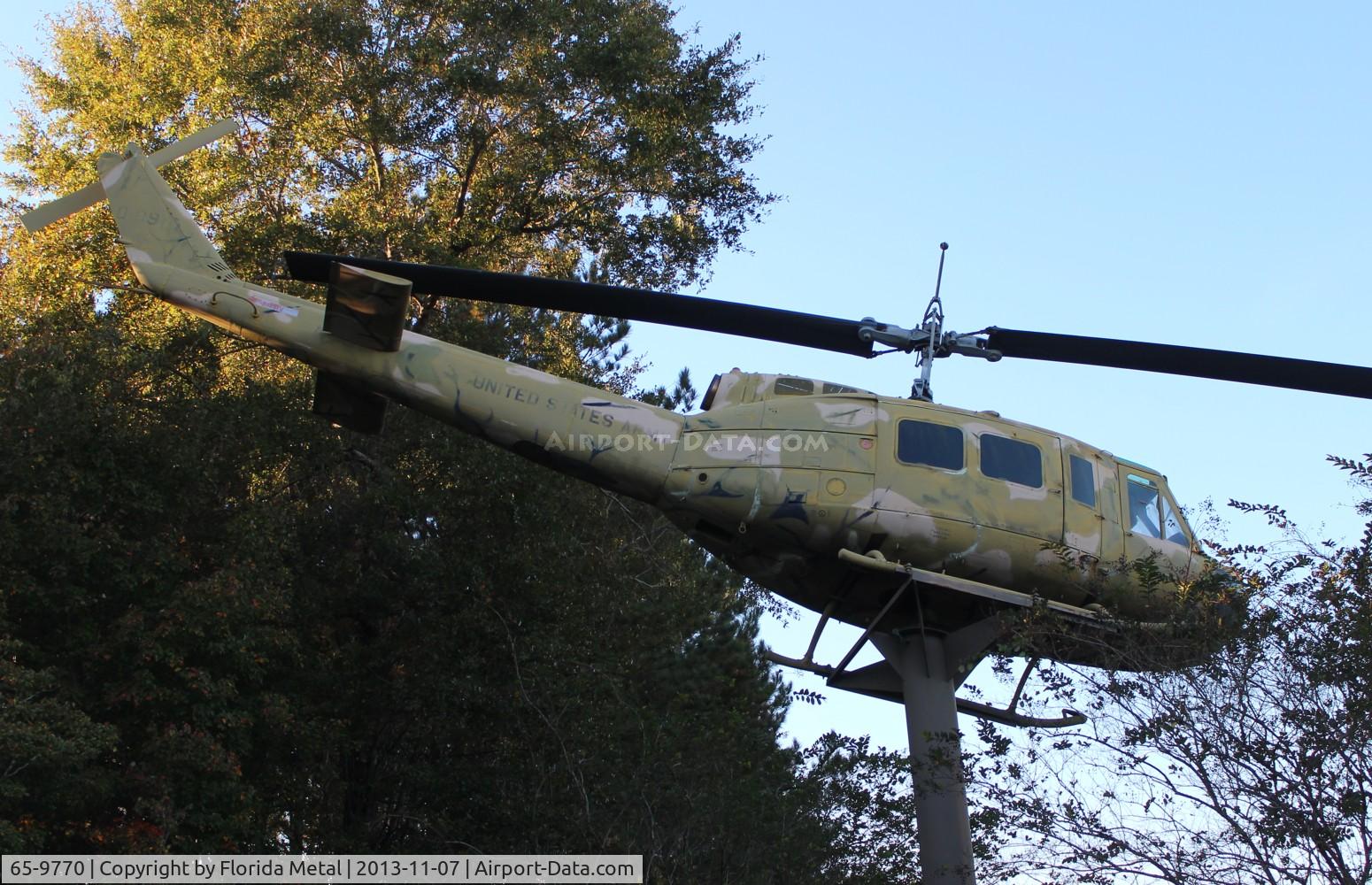 65-9770, 1965 Bell UH-1H Iroquois C/N 4814, UH-1 on post along Hwy 231 in Ozark Alabama