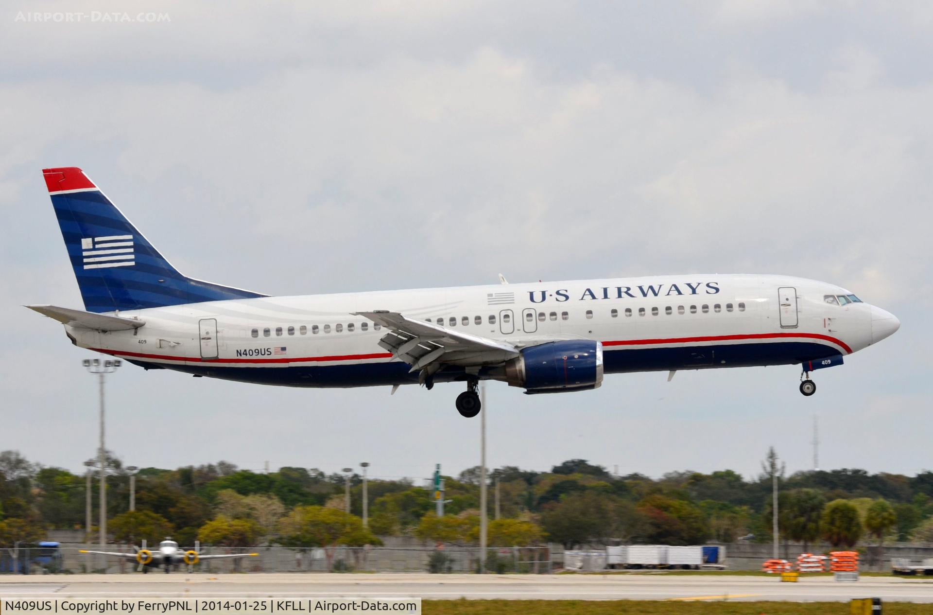 N409US, 1988 Boeing 737-401 C/N 23879, Classic US B734 landing