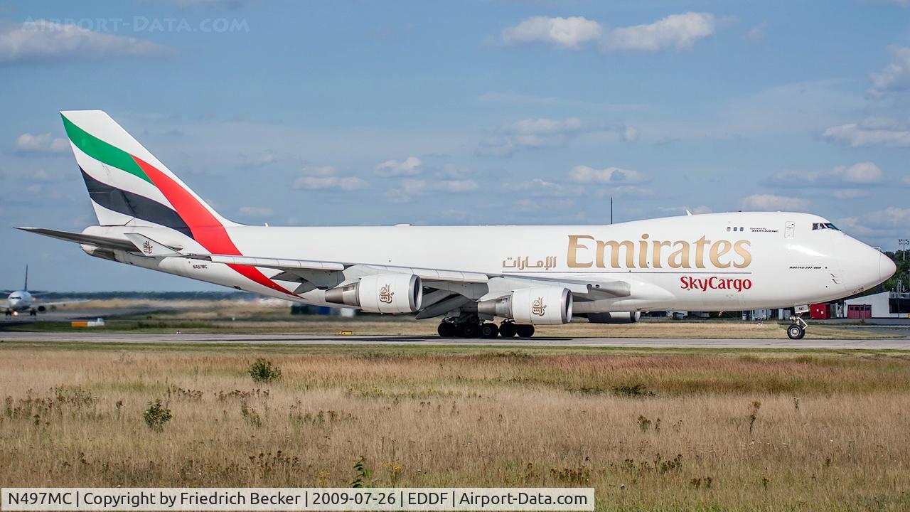 N497MC, 1999 Boeing 747-47UF C/N 29258, departure via RW18W