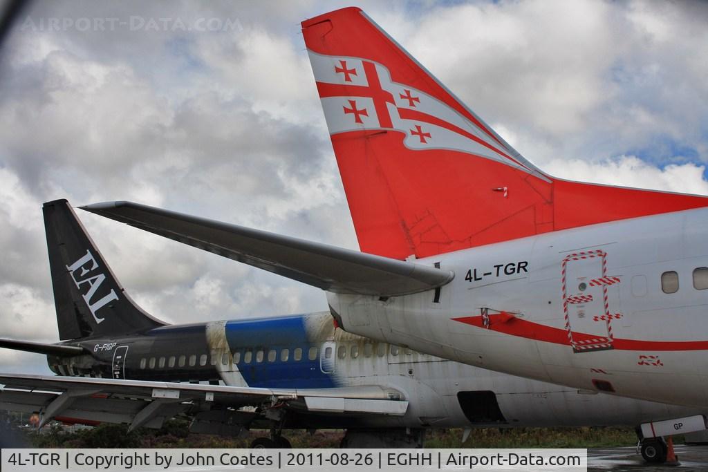 4L-TGR, 1990 Boeing 737-59D C/N 24694, At European with G-FIGP