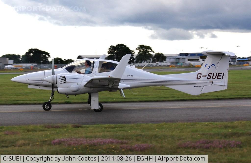 G-SUEI, 2009 Diamond DA-42 Twin Star C/N 42.415, Taxiing on arrival