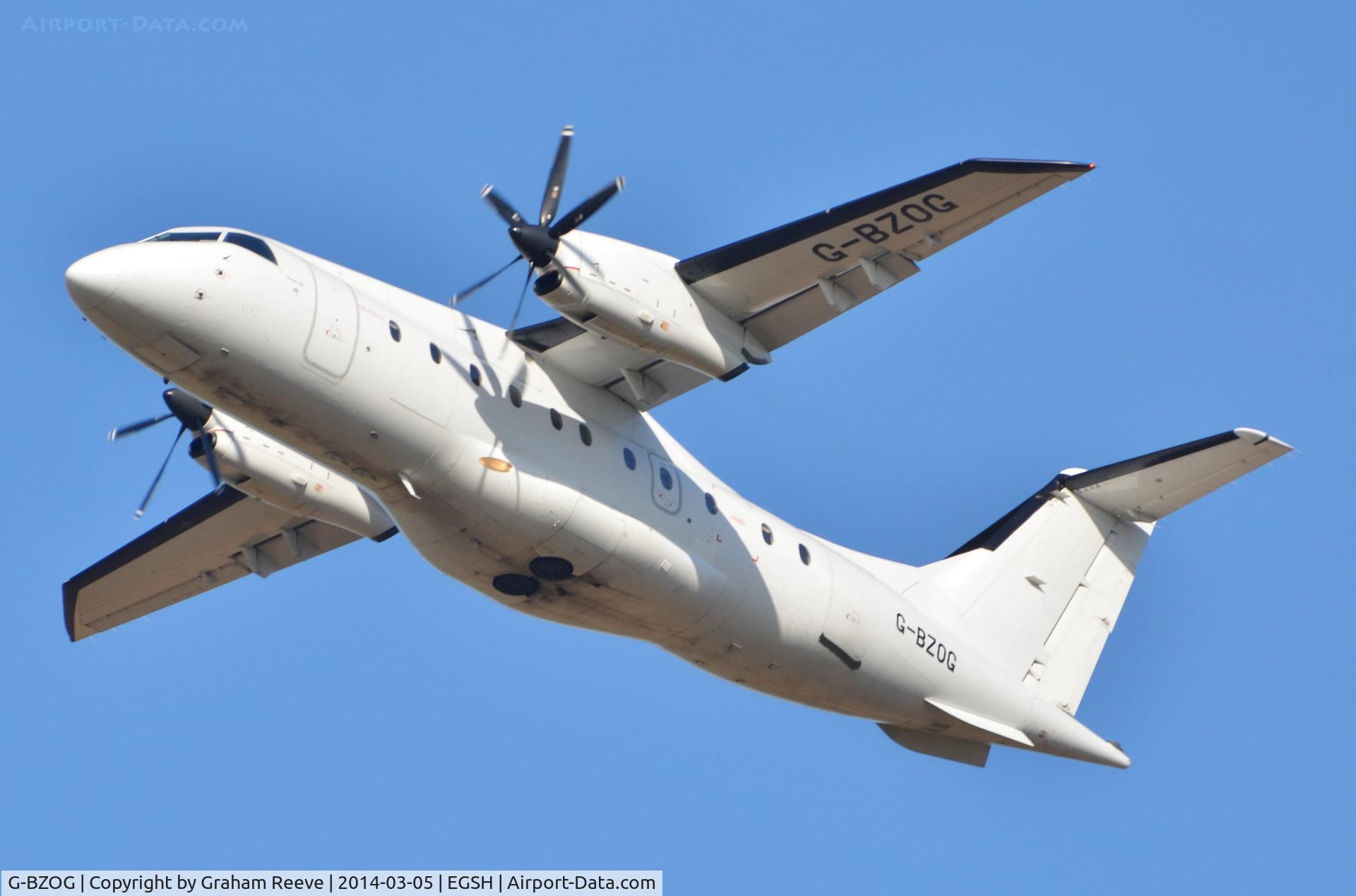 G-BZOG, 1998 Dornier 328-100 C/N 3088, Climbing out.