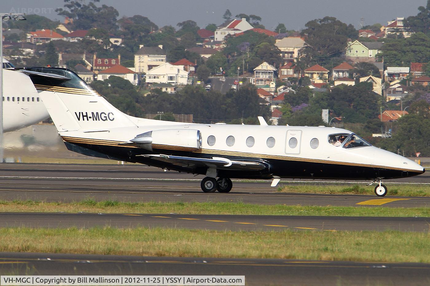 VH-MGC, 1995 Beech 400A Beechjet C/N RK-97, taxiing from 34R
