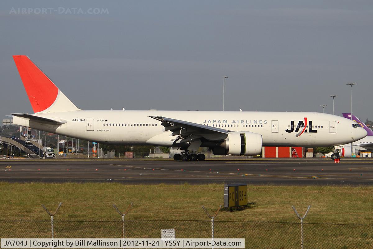 JA704J, 2003 Boeing 777-246/ER C/N 32892, landed...on 34L
